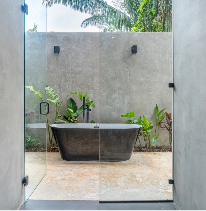 Open-air soaking tub in a private villa